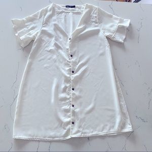 White dress or long top (depending on height or event)